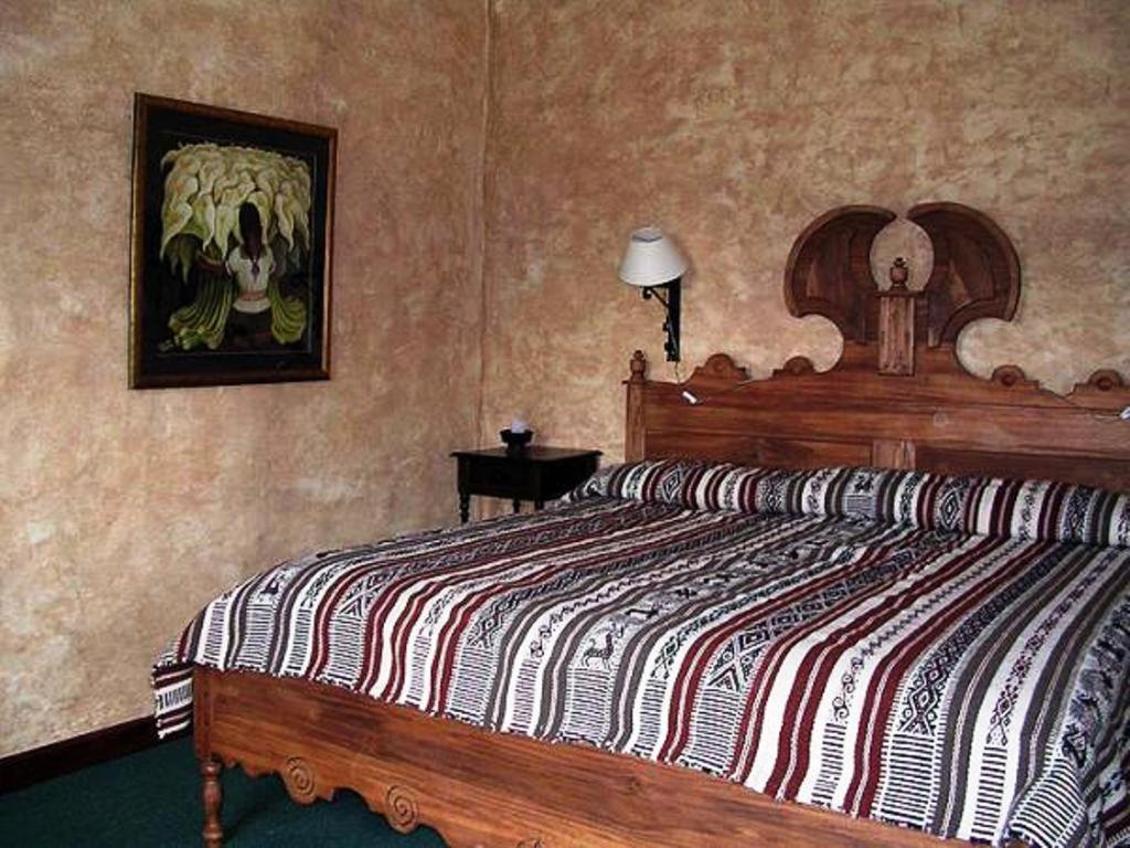אוטהוואלו Las Palmeras Inn חדר תמונה